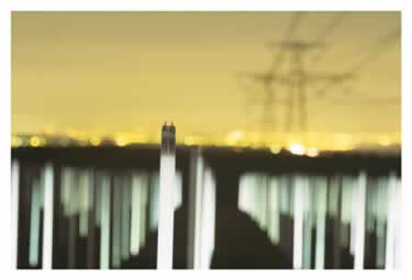 Illustration for article titled 1,301 Florescent Bulbs Lit Solely by Magnetic Fields